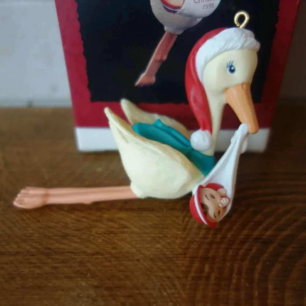 NEW Vintage Hallmark Ornament Baby's First Christmas Stork Holding Baby 1995